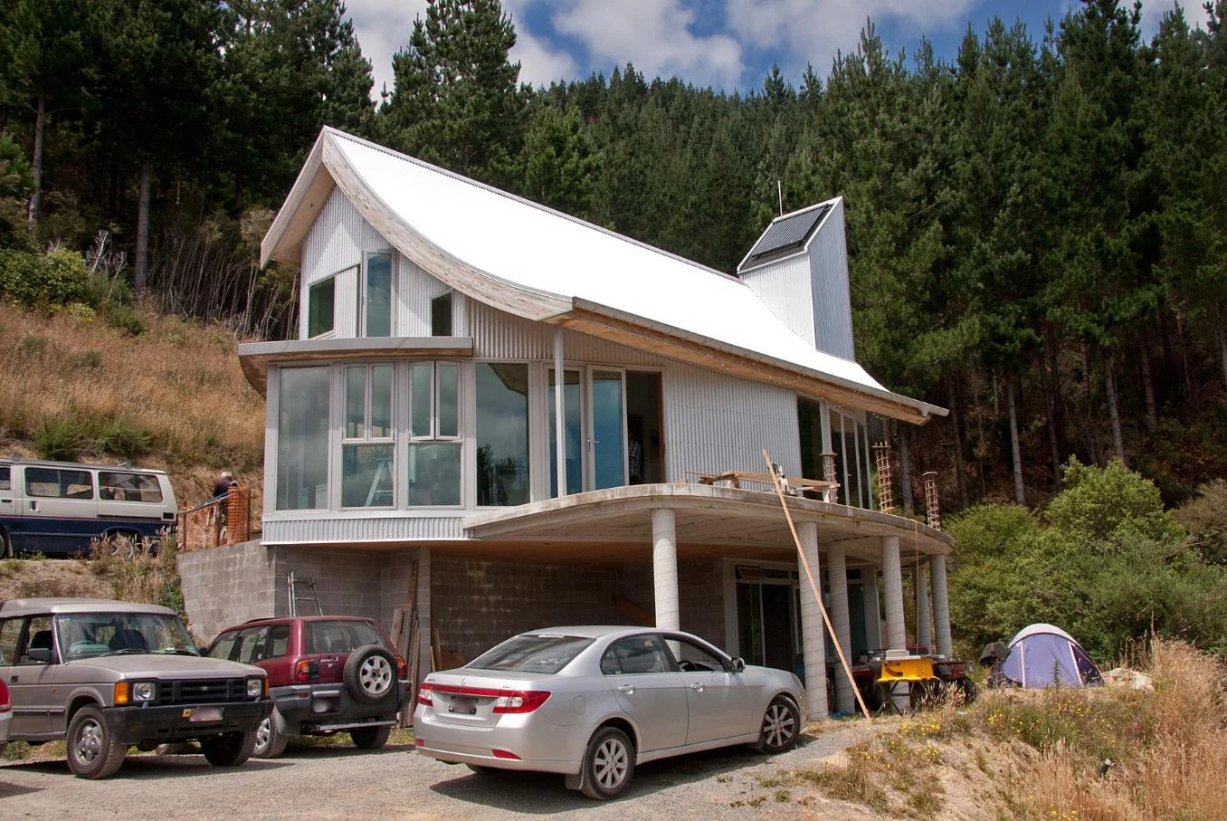 Nicholls House under construction, showing the curved roof and elevated structure